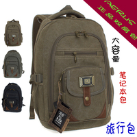 特价正品包包男包双肩包帆布包韩版 潮男笔记本包旅行包休闲背包