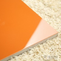 橙黄色亮光面微晶石瓷砖600x600客厅高级纯橘黄色光滑面地面砖